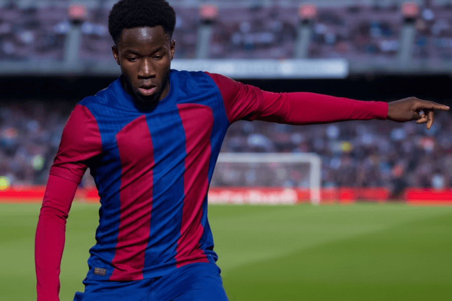 Ebrima Tunkara concentré avant un match, prêt à entrer sur le terrain sous les couleurs du FC Barcelone.