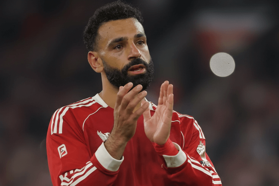 Liverpool en action sur le terrain durant un match.