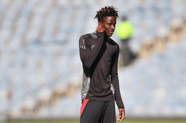 Kimvuidi célébrant une passe décisive sur le terrain.