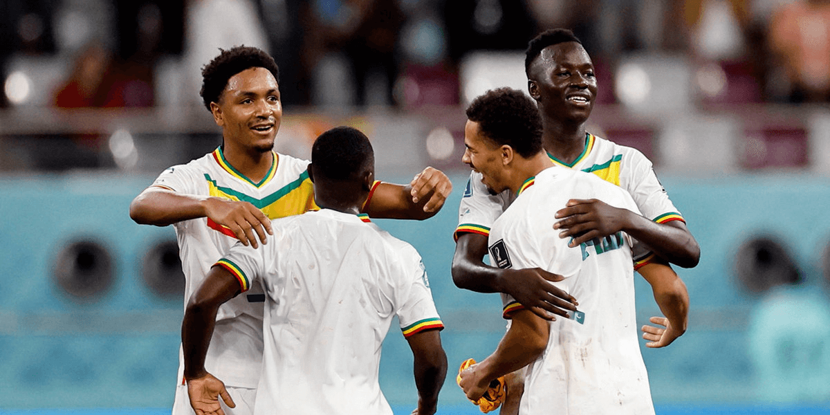 L'équipe du Sénégal célébrant une victoire lors d'un match